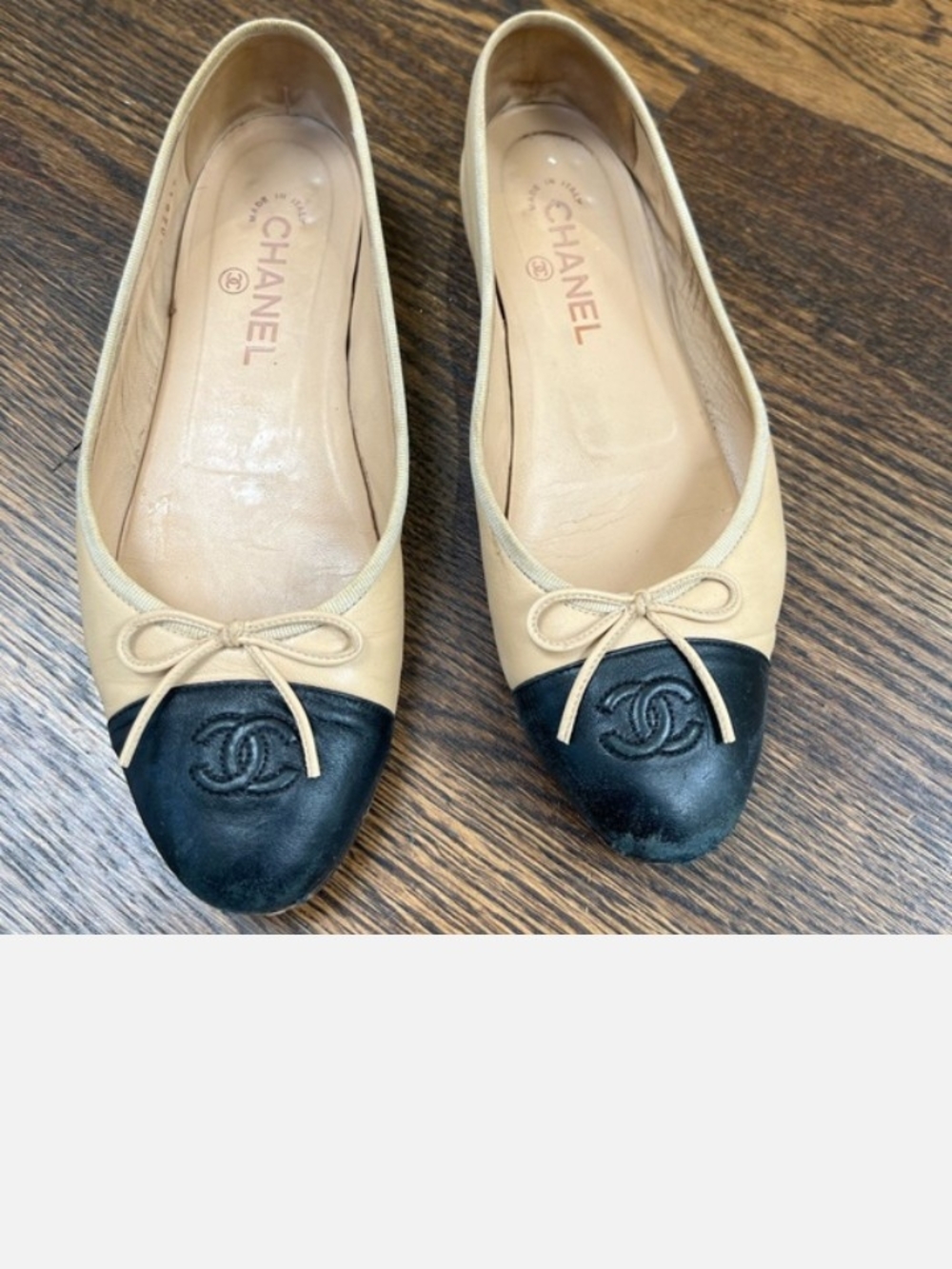 CHANEL Beige Leather Ballet Flats with Black Cap Toe and CC Logo